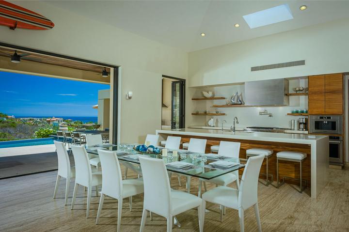 Kitchen island and dining table at Casa Isabelle