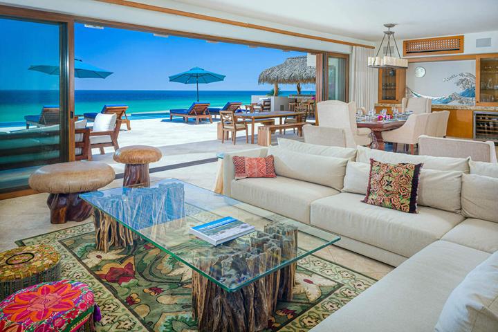 Living room opening onto the beachfront terrace at Villa Bahia de los Frailes