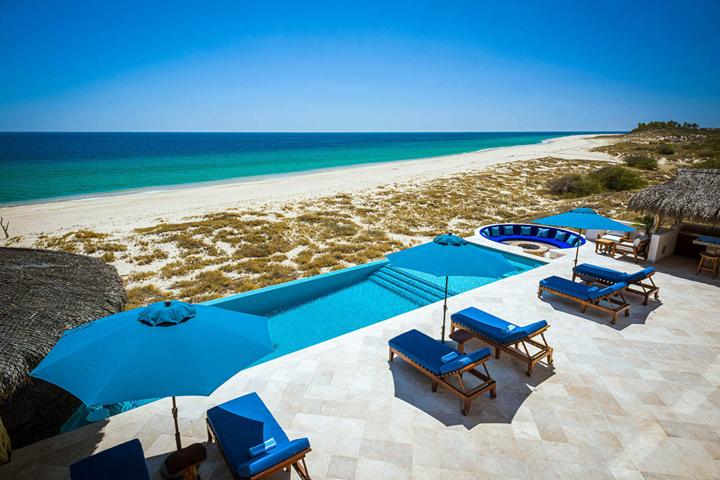 Aerial view of the pool deck and beach at Villa Bahia de los Frailes